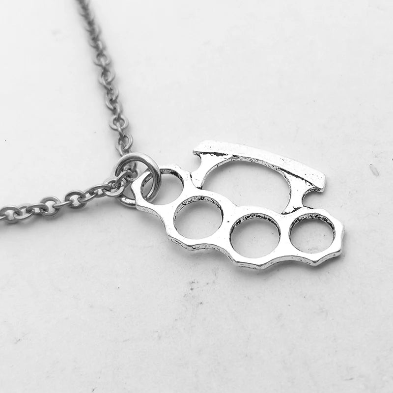 Brass Knuckles Pendant