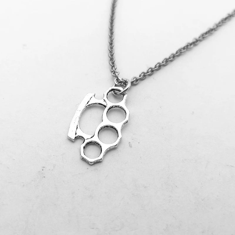 Brass Knuckles Pendant