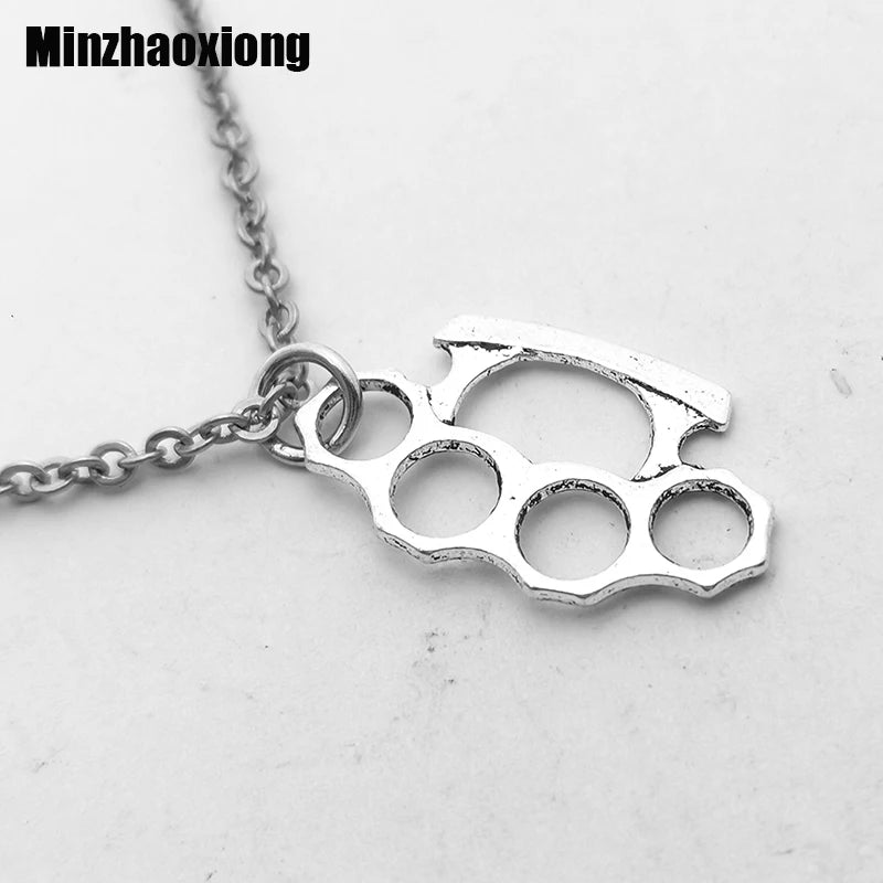 Brass Knuckles Pendant